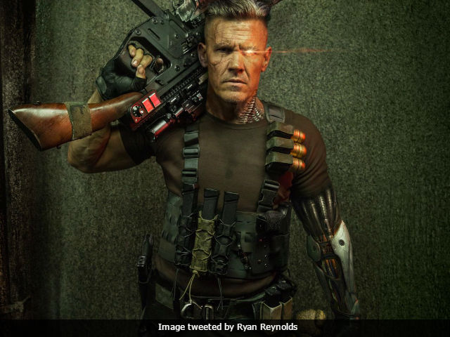 <i>Deadpool 2</i>: Ryan Reynolds Posts First Look Of Josh Brolin As Cable. With Guns And, Umm, Teddy Bear