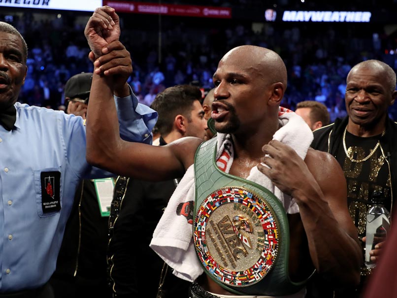 Fifty And Out As Floyd Mayweather Stops Conor McGregor