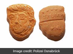 Germany's Orange Ecstasy Pills Have Trump's Name - And Face - All Over Them
