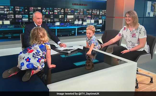 Watch: Anchor Upstaged By Toddler On Live TV