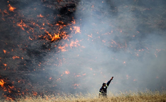 Firefighters Battle Wildfires Across Greece