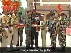 Indian, Pakistani Border Guards Exchange Sweets On Independence Day