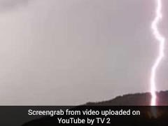Lucky Escape For Man Filming Thunder As Lightning Strikes Meters From Him