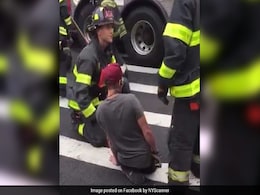 Video: Man Stuck In Tiny Sinkhole As Road Collapses, Rescued By Firemen Video: Man Stuck In Tiny Sinkhole As Road Collapses, Rescued By Firemen