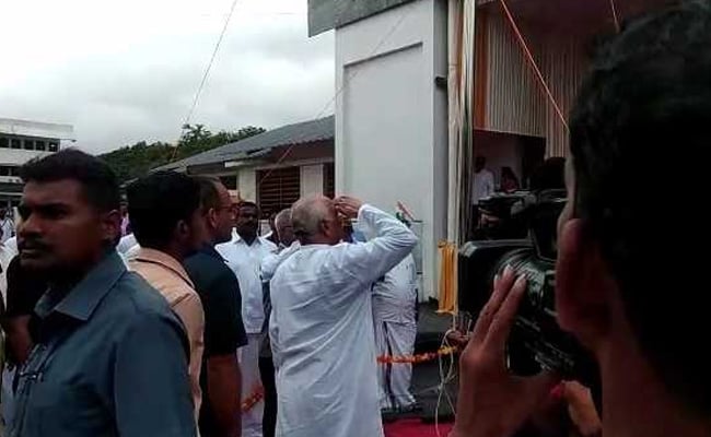 Image result for RSS chief ignores Kerala bureaucrat's order, unfurls flag at a school