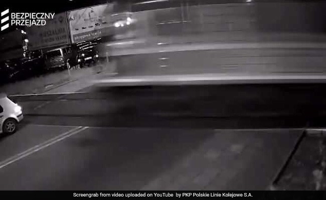 Watch: Car Breaks Through Barrier. Then, Near Miss With Train