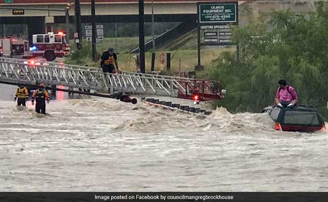Watch: Rescue Of Man Stranded On SUV Rooftop In Raging Floods