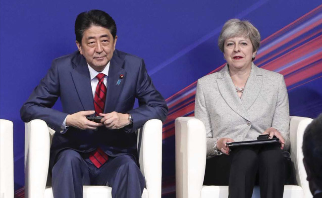 British PM Theresa May Attends Top Security Meeting In Japan