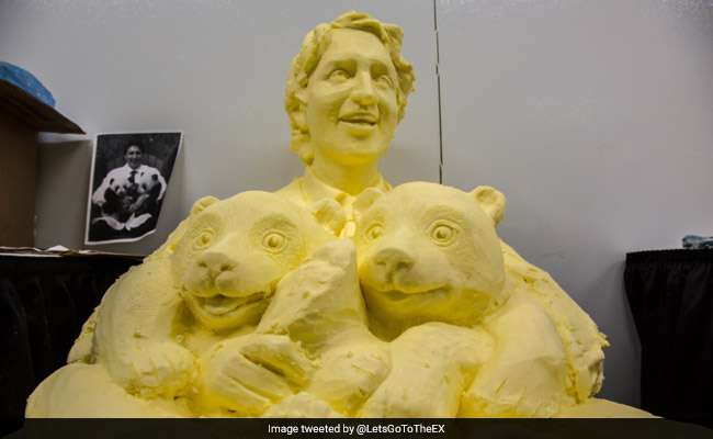 Justin Trudeau Cuddling Pandas. Now An Utterly, Butterly Bizarre Sculpture