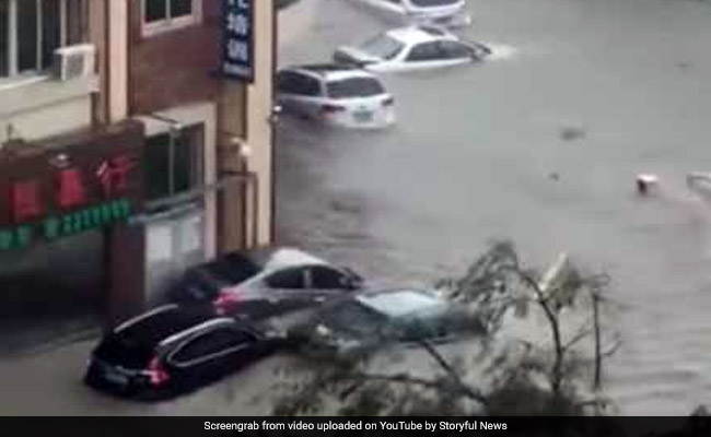 Shocking Video Shows Cars Floating In Floodwater As Typhoon Sweeps China