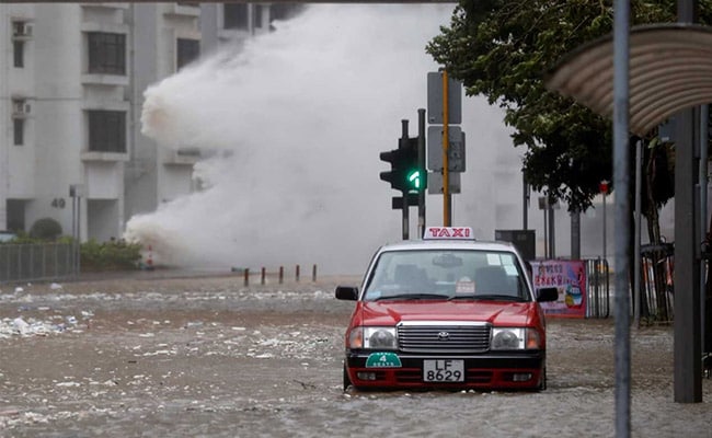 Typhoon Batters Hong Kong, Streets Flooded, Trading Halted