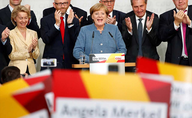 Merkel Heads For Another Term In Germany, But Far Right Spoils The Party