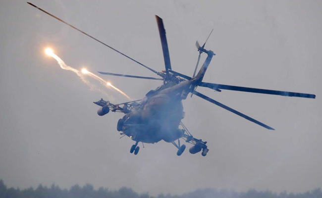 Helicopter Mistakenly Fires On Parked Vehicles In Russia War Games