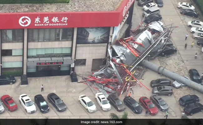 Giant Billboard Crushes Parked Cars After Getting Knocked Down By Wind