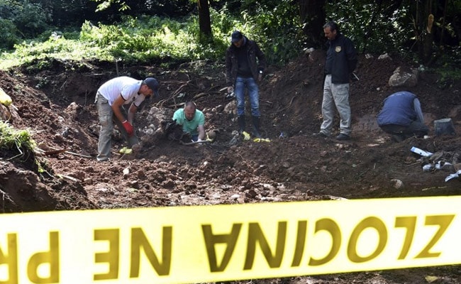 Mass Grave With Nearly 100 Bodies Found In Bosnia