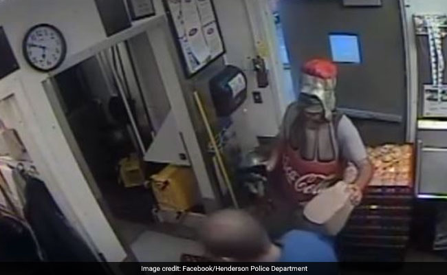 Watch: Man Dressed As Coca-Cola Bottle Robs Restaurant. No, Really