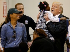 Donald Trump Hugs Children, Serves Food In Visit To Victims Of Harvey
