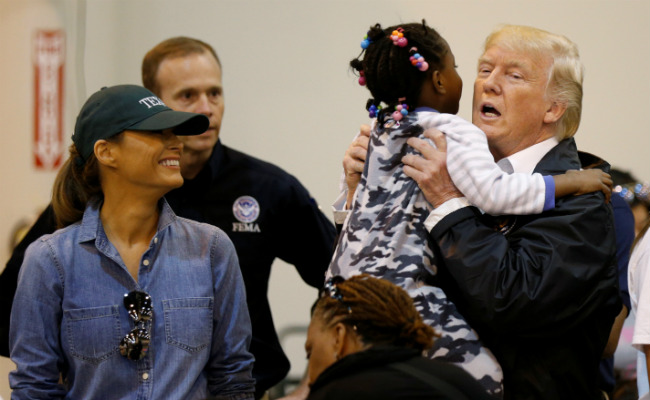 Donald Trump Hugs Children, Serves Food In Visit To Victims Of Harvey