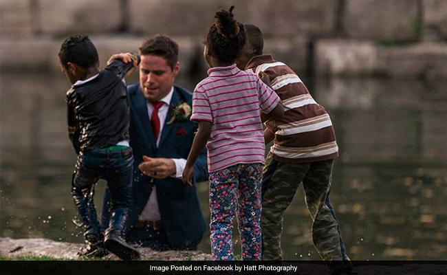 Groom Saves Child From Drowning In River. Pic Of That Moment Is Now Viral