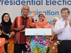 Singapore Gets First Female President Without A Vote