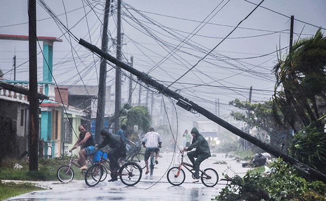 a Weakens From Hurricane To Tropical Storm 