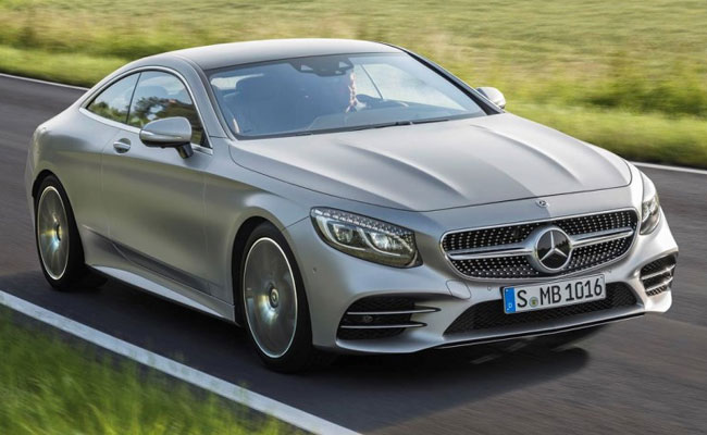 बढ़े जीएसटी उपकर का बोझ ग्राहकों पर डाल सकती हैं कार कंपनियां