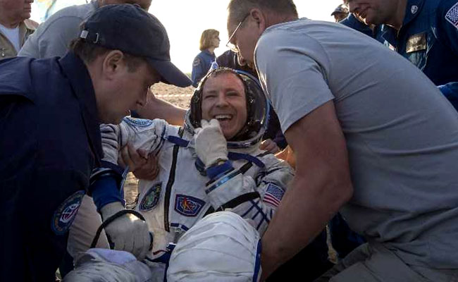 Record-Breaking Astronaut, A Woman, Comes Back To Earth