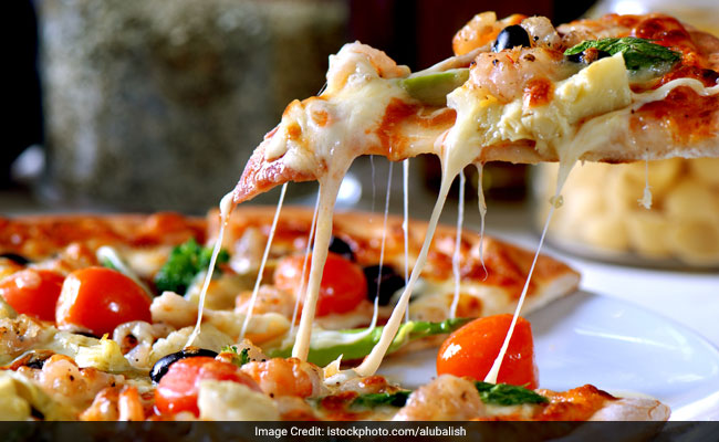 Think Pizzas are Great Party Foods? Your Weight May Decide How You Assess Food!