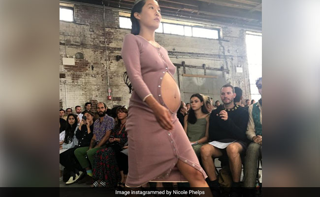 Sexy mama: Italian model runs the catwalk six months pregnant