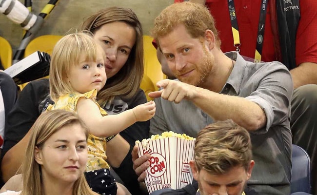 Watch This Little Girl Steal Prince Harry's Popcorn - And All Of Our Hearts