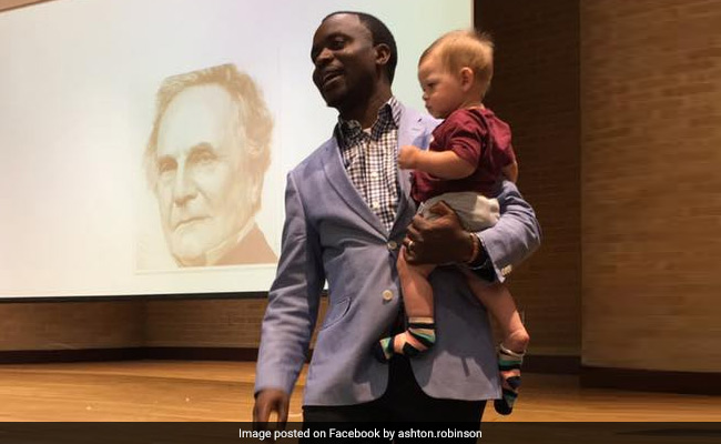 Professor Holds Student's Child During Class So She Doesn't Miss Lecture