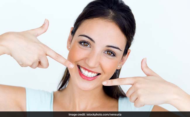 World Oral Health Day 2018: Get Rid Of Yellow Teeth With These Home Remedies