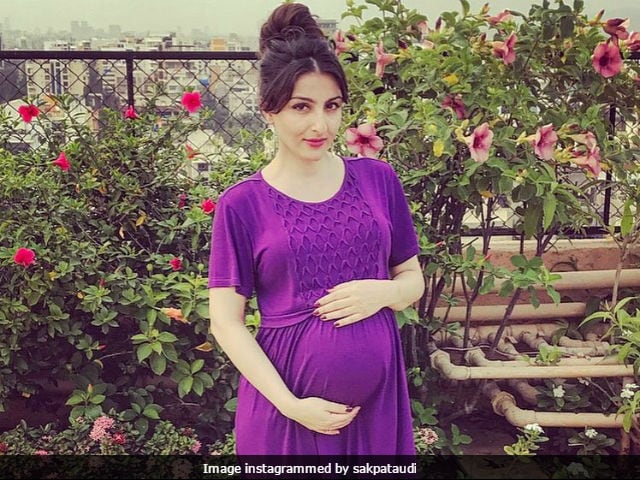 Pregnant Soha Ali Khan glows in a traditional pink saree in new