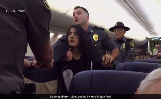 Caught On Camera: Cops Tug At Woman Passenger, Drag Her Down Aisle