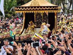 Sultan Of Bling: Brunei Monarch Travels In Gilded Chariot