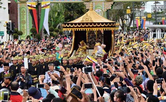 Sultan Of Bling: Brunei Monarch Travels In Gilded Chariot