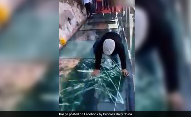 In China, Glass Bridge 'Cracks' With Each Step. Dare To Walk On It?