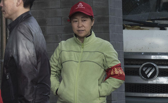 Xi's Eyes And Ears In Beijing: Red-Armband Army Of 'Volunteers'