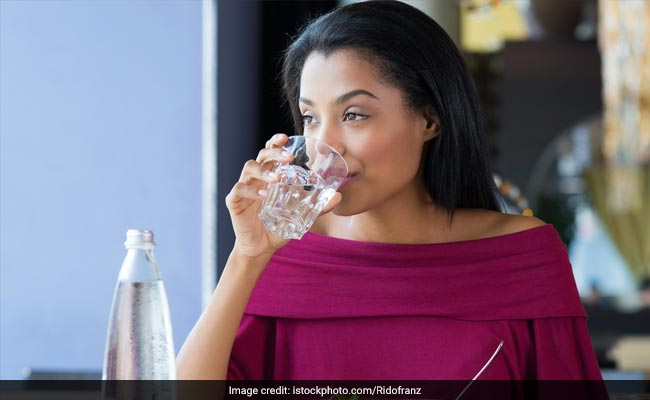 women bottled water