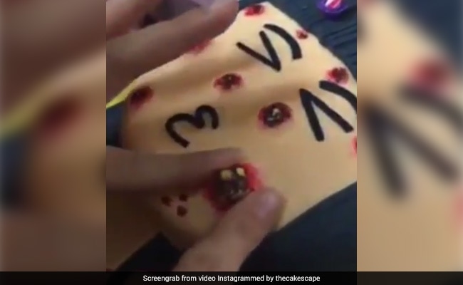 Have You Seen This Pimple-Popping Cake? It's So Bad It's Good