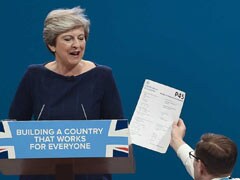 British PM Theresa May Given 'Pink Slip' During Speech. Watch The Moment