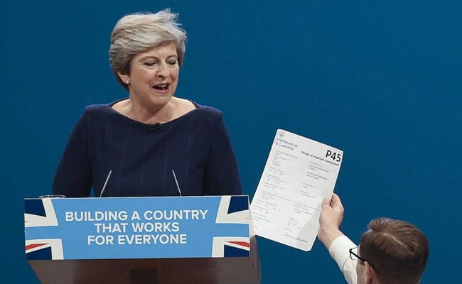 British PM Theresa May Given 'Pink Slip' During Speech. Watch The Moment