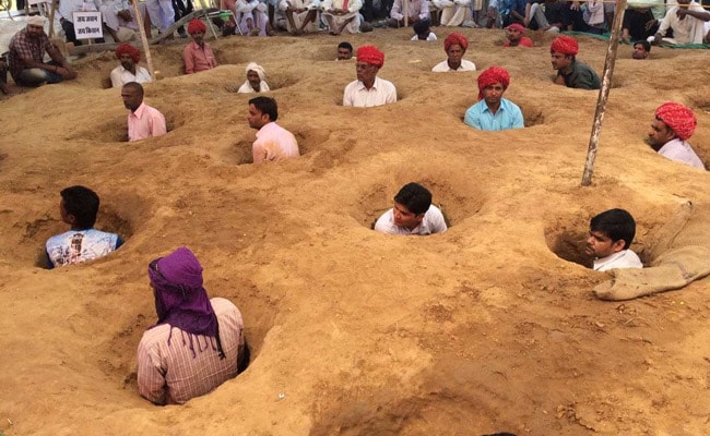 Buried In Mud, Rajasthan Farmers Protest Over Land Compensation