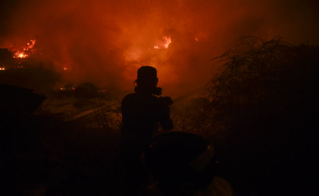 Wildfire Toll Hits 45 In Portugal, Spain But Rain Brings Respite