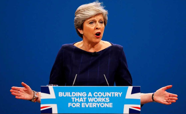 At Theresa May's Keynote Speech, Prankster Gives Unemployment Notice