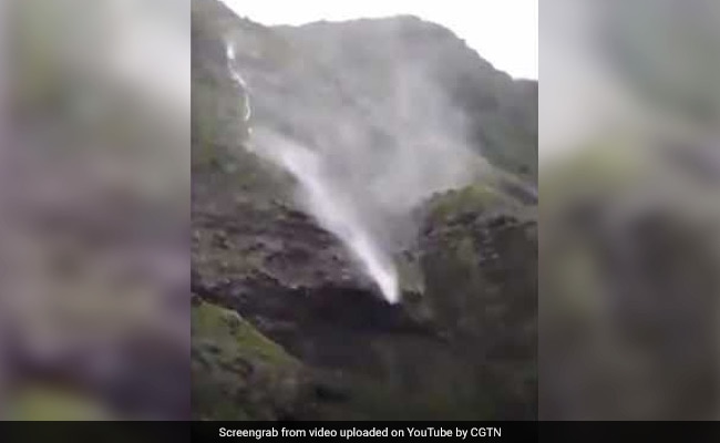 Amazing Video Captures Gravity-Defying Waterfall