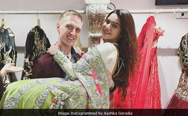 Here Are Aashka Goradia And Brent Goble's Sangeet Outfits