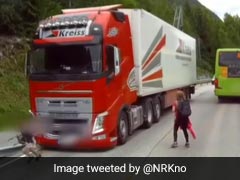 Heart-Stopping Moment Child Runs Into Traffic, Is Almost Run Over By Truck