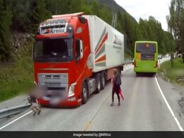 Heart-Stopping Moment Child Runs Into Traffic, Is Almost Run Over By Truck Heart-Stopping Moment Child Runs Into Traffic, Is Almost Run Over By Truck