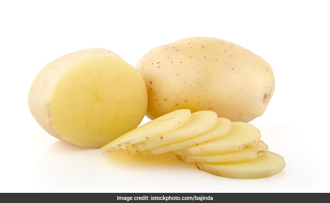 potato helps in removing water under the eyes
